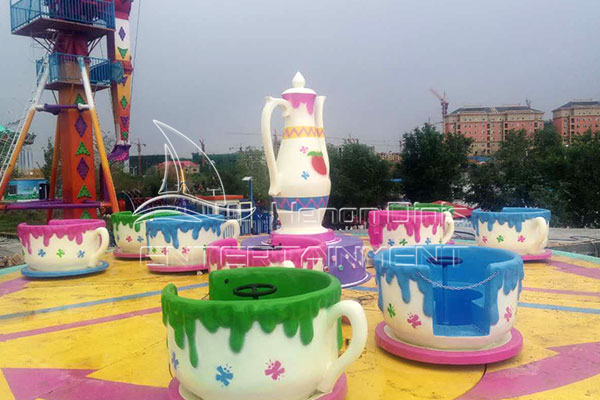 Colorful Fairground Cup Amusement Rides Displayed in Dinis's Exhibition Hall