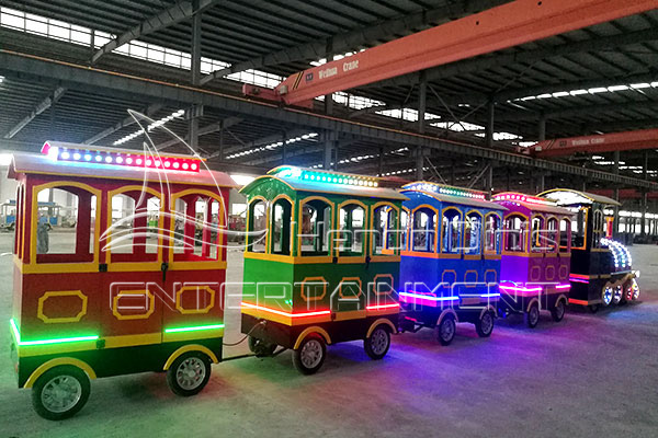 Dinis Cartoon Vintage Carnival Train Rides for Sale with Colorful Lights at Night